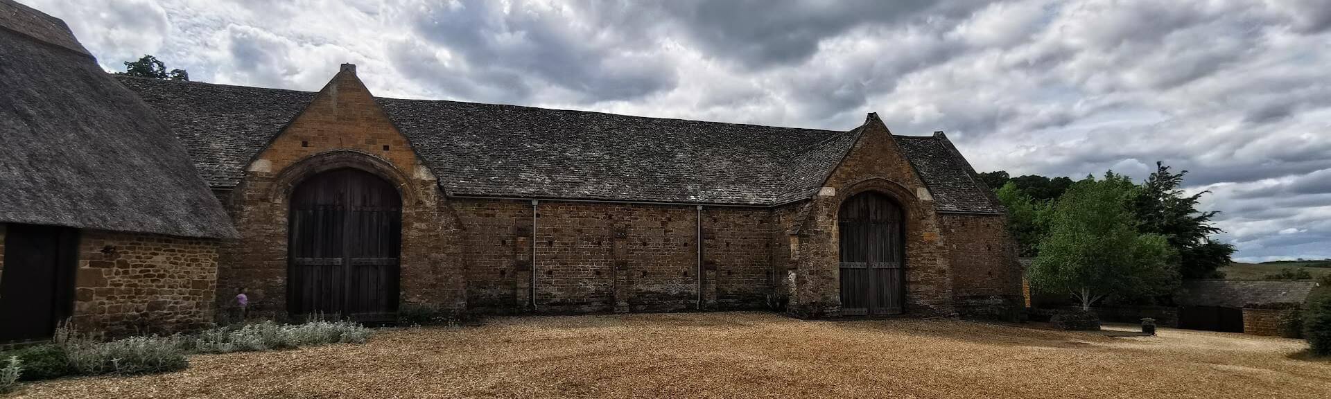 Swalcliffe Barn exterior with timber doors